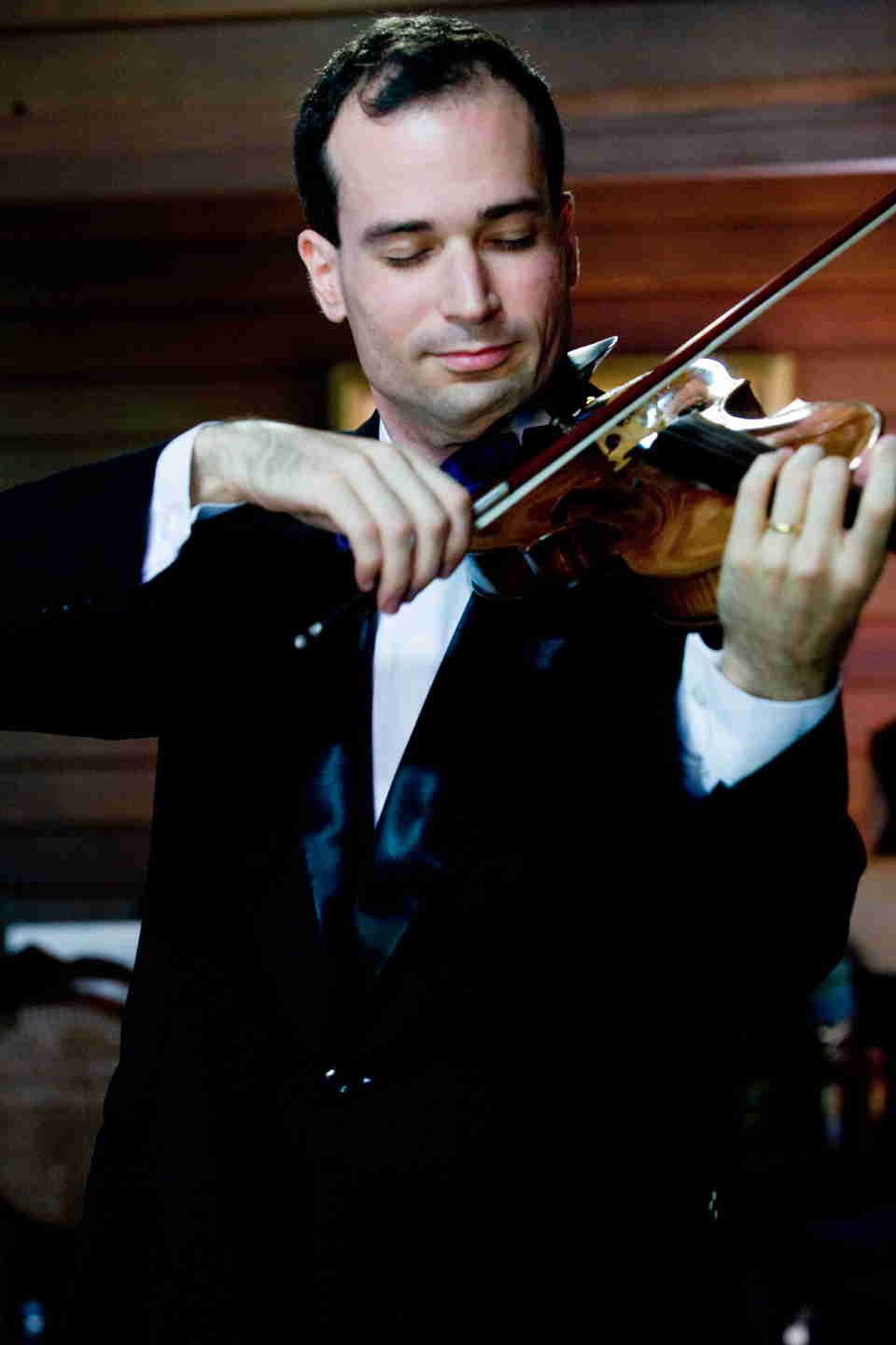 Dr Zoltan Paulinyi playing the violino